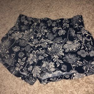 Navy blue and white floral shorts